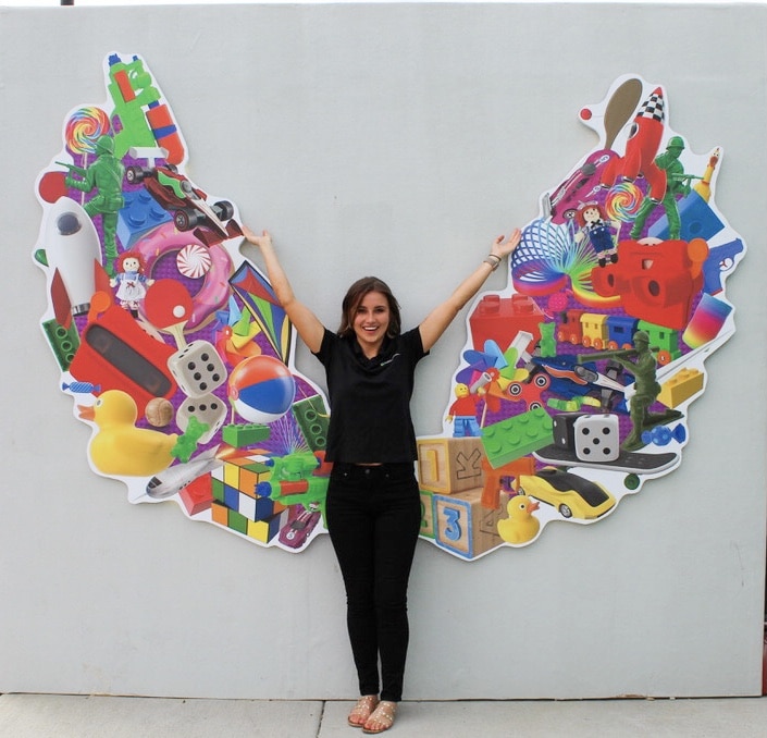 Selfies with toy wings at Toy Box Mini Golf