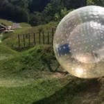 Race Down Hill in GIANT Water Ball at Outdoor Gravity Park