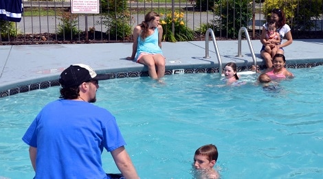 family in pigeon forge at ramada pool