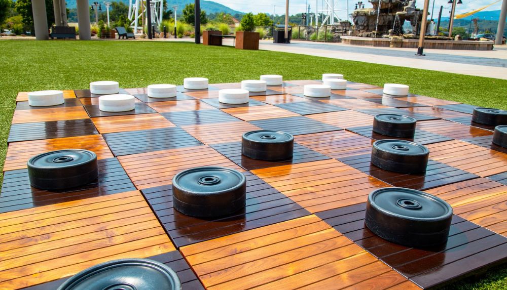 Stroll The Mountain Mile Tower Shops and play a game of checkers on their giant board.