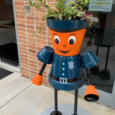 ‘Servin and Protectin'” Planter City Hall Planter