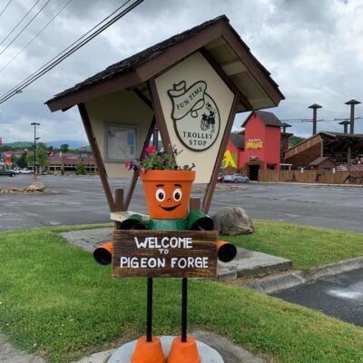 “Welcome to Pigeon Forge” Planter Lumberjack Trolley Stop Planter