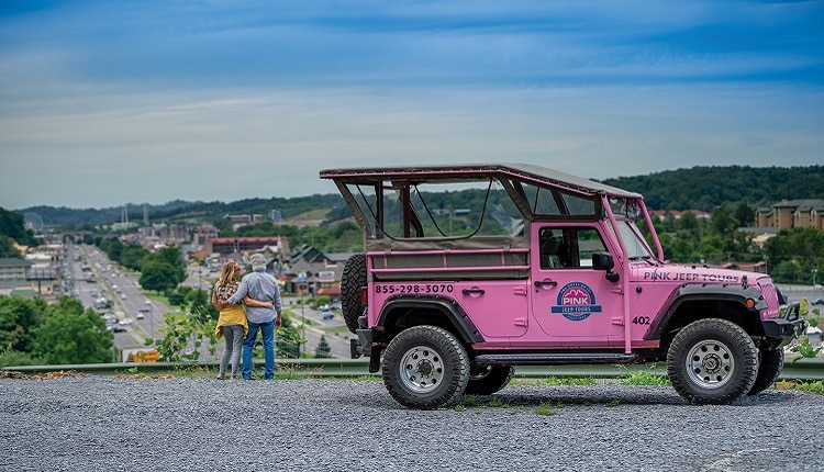 Couple Taking in Views on a Pink Jeep Tour in Pigeon Forge, Tennessee