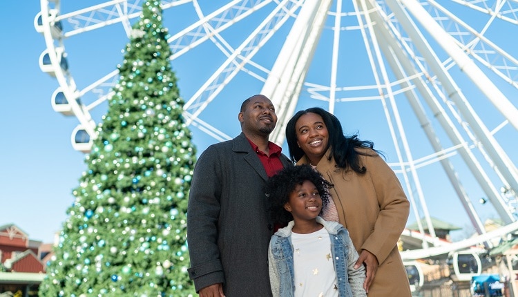 Family Enjoying Christmas at The Island in Pigeon Forge
