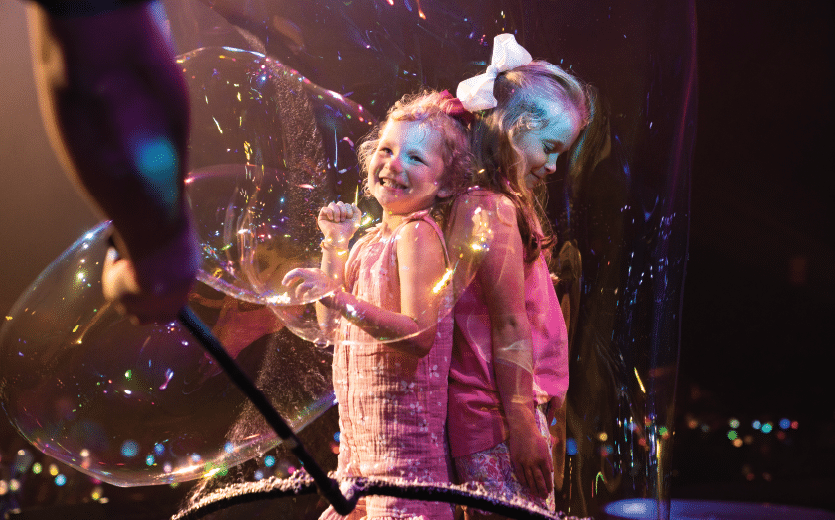 kids playing with bubbles at Dollywood's Smoky Mountain Celebration