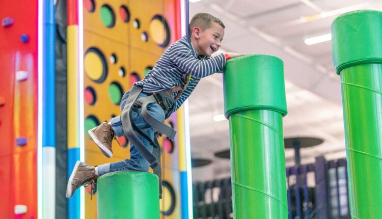 Climb and bounce around at TopJump Trampoline & Extreme Arena