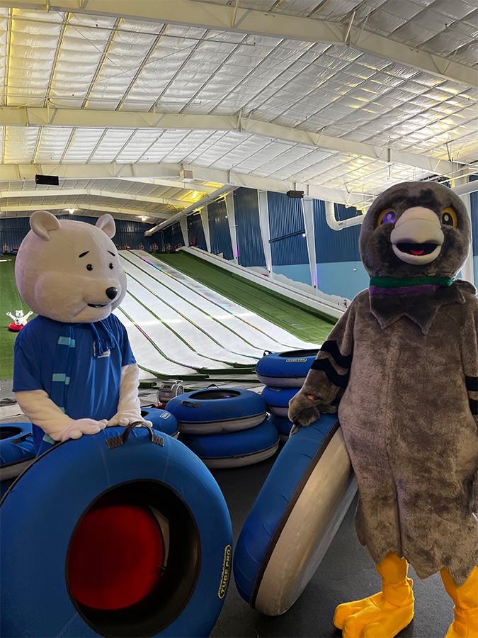 Pops the Polar Bear and Martha the My Pigeon Forge Mascot posing for a pic