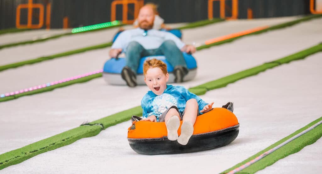 Kid snow tubing at Pigeon Forge Snow