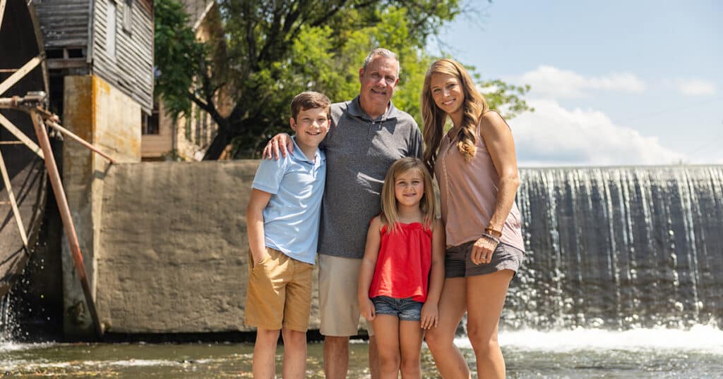 Family photo in front of The Old Mill in Pigeon Forge