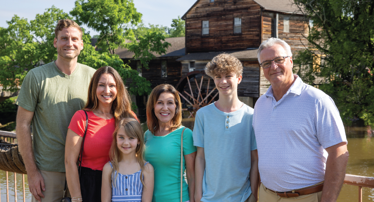 snap a family photo in front of old mill
