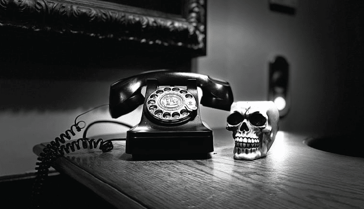 image of phone in a pigeon forge escape room game