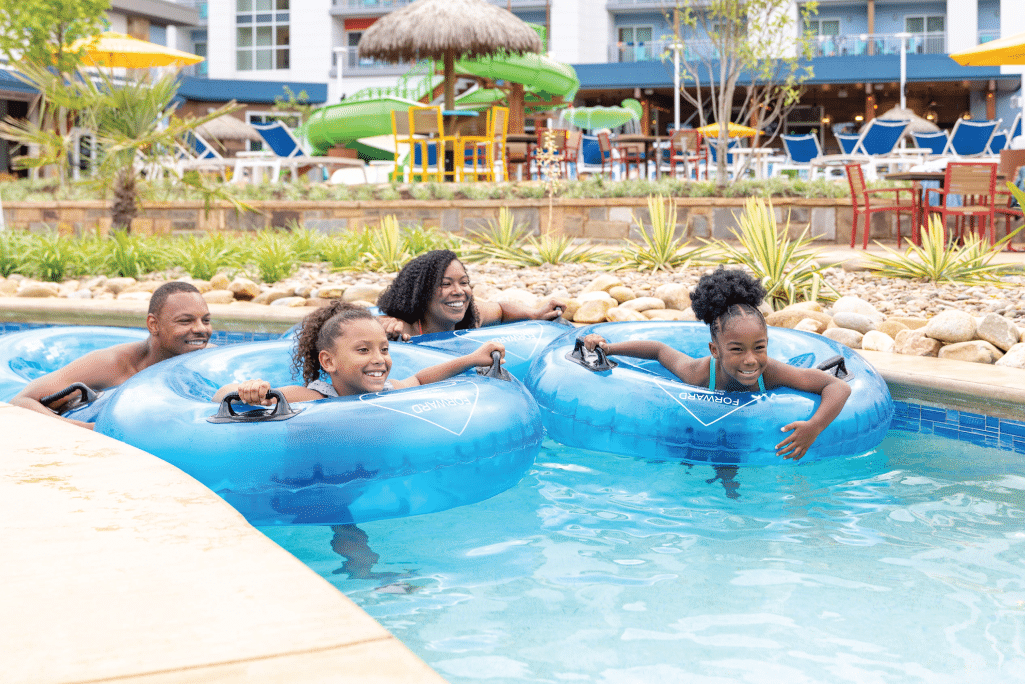 image of family on lazy river