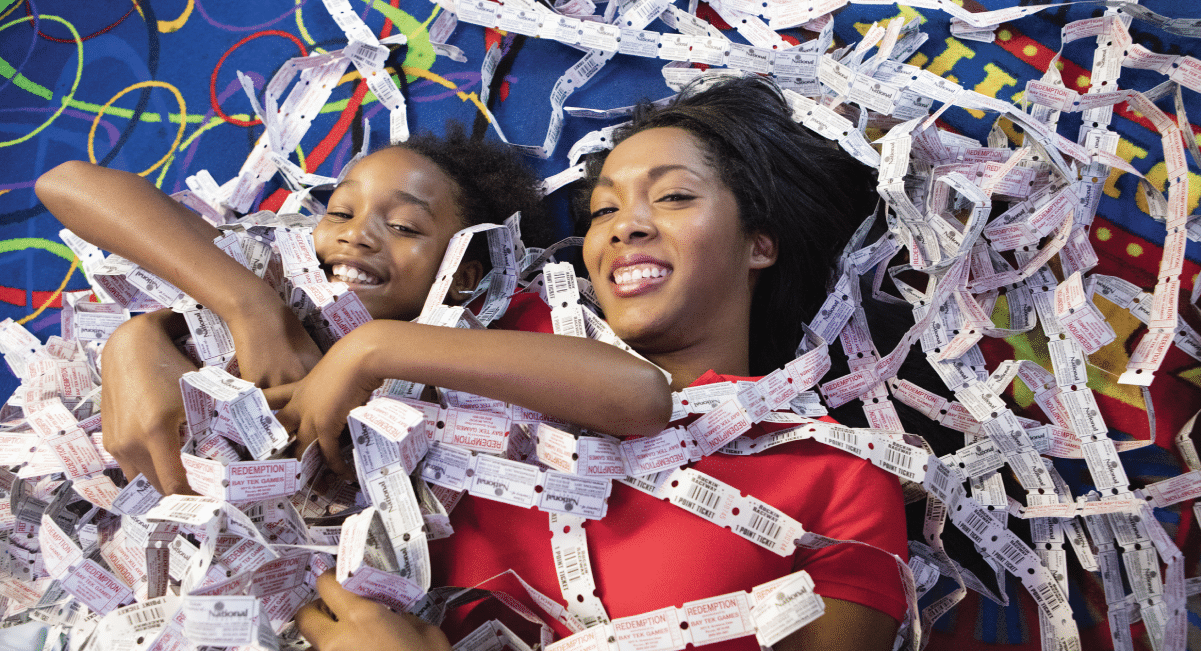 image of family with coupons for pigeon forge