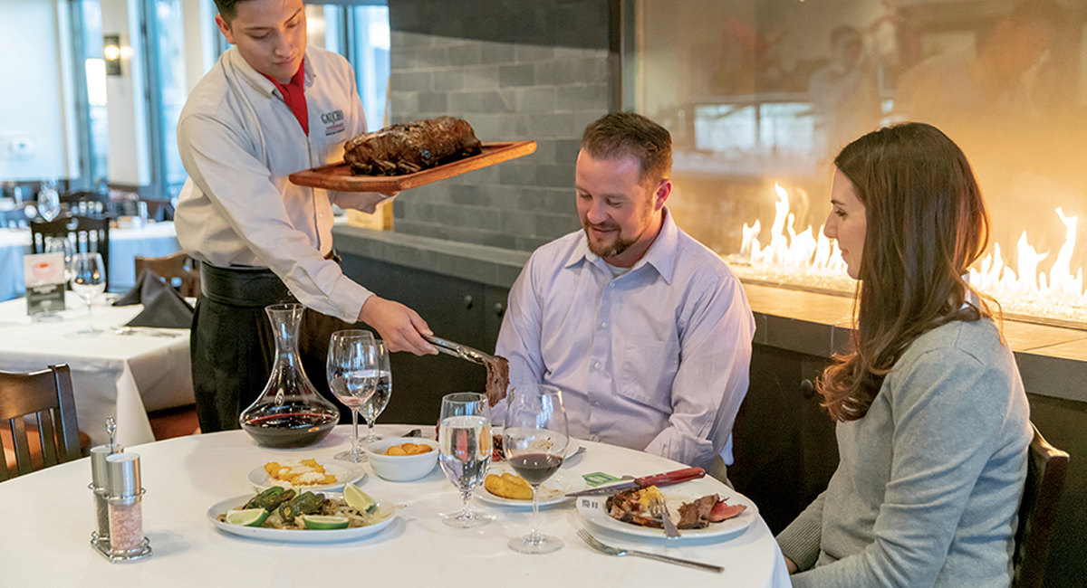 adults having dinner at Gaucho Urbano in pigeon forge